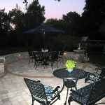 Outdoor lighting installed on a paver patio